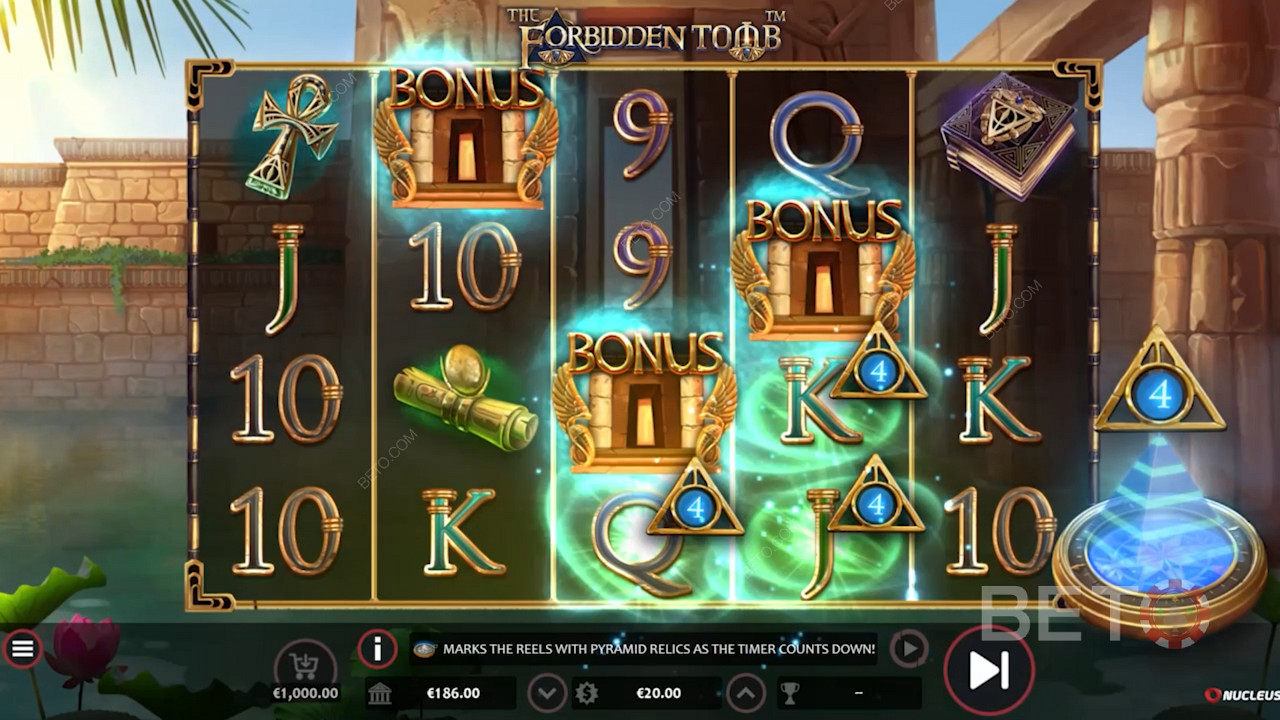The Forbidden Tomb 비디오 게임에서 5~10개의 와일드로 무료 스핀을 트리거하세요. Nucleus Gaming